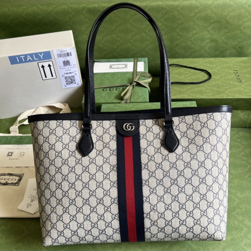 G*u*i shopping bags